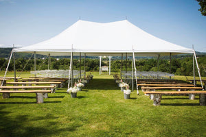 pole tent for an outdoor wedding ceremony