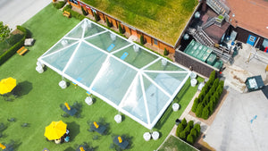 large clear party tent with transparent roof