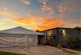 40x40 frame tent at sunset