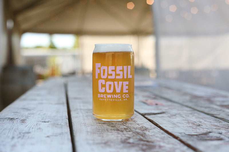 glass of beer in front of tent