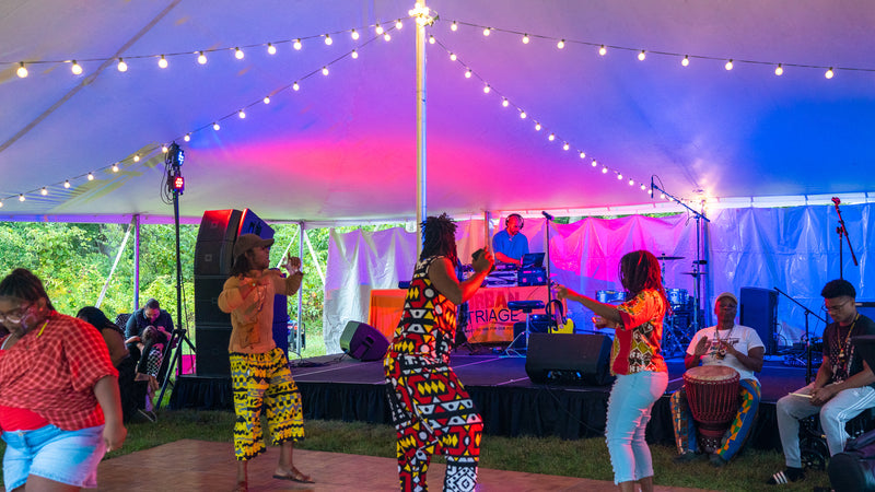 concert tents with guests dancing